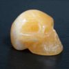 Orangen Calzit Totenkopf 3,6x4,9cm, 93 gram